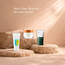 Three skincare products on stone platforms with a beige background and text 'Start Your Routine'.