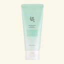 Skincare product with text on a light green background