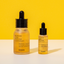 COSRX-Full-Fit-Propolis-Light-Ampoule small and big on a table