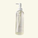 Bottle of Nussoon cleansing oil with pump on a white background