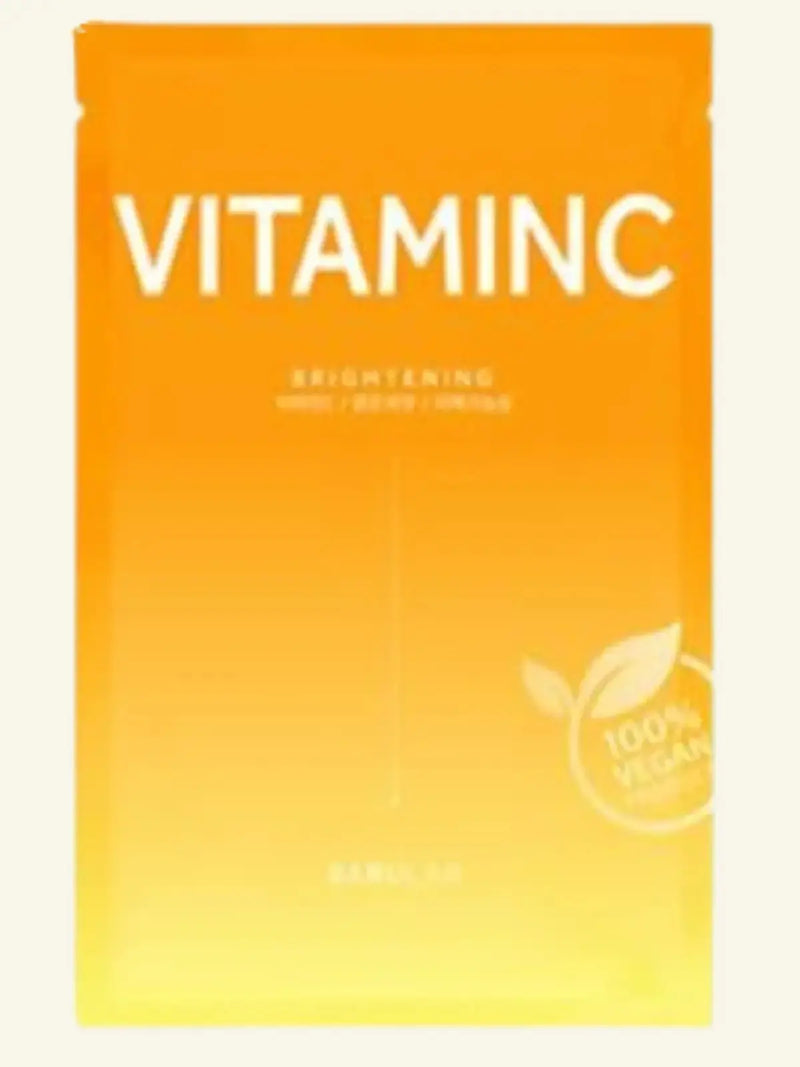 Vitamin C skincare product packaging with gradient design on a white background