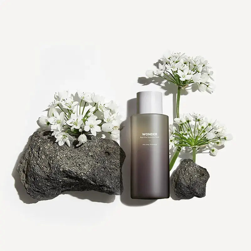 Haruharu Wonder Black Rice Hyaluronic Toner in a botanical setting