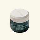 Cosmetic jar with 'Marine Care' and 'Algae + Panthenol' text on a white background