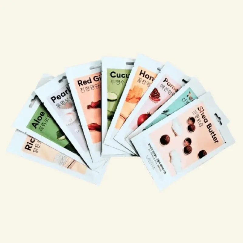 Assorted skincare mask packets on a beige background