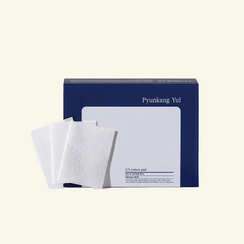 Pyunkang Yul cotton pads with packaging on a light beige background
