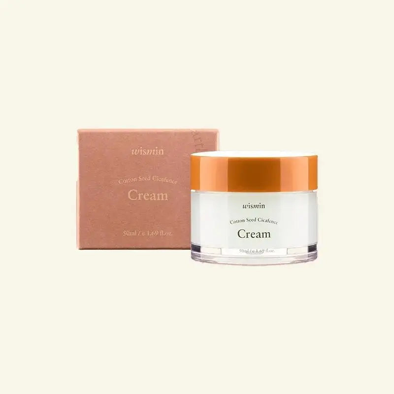 Jar of cream with orange lid and matching box on a beige background