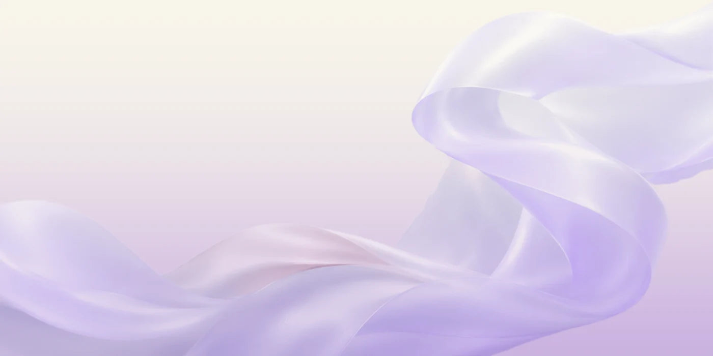 Luminous silk folds in lavender and pearl grey.
